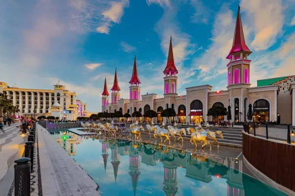 The Land of Legends theme park and shopping avenue in Belek, Antalya, Turkey at sunset
