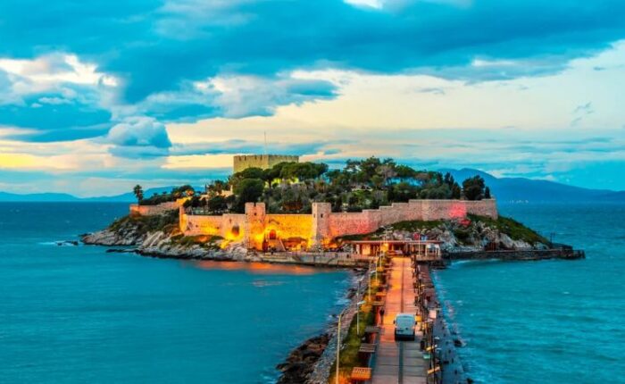 Text: Kusadasi Castle and Pigeon Island at sunset, aerial view Turkey