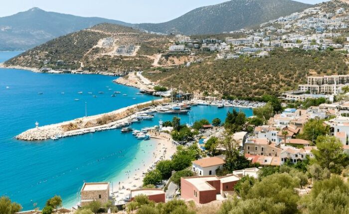 Coastal town of Kalkan, Antalya, Turkey with beach and harbor view