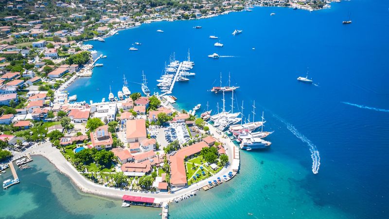 Coastal town of Kalkan, Antalya, Turkey with beach and harbor view